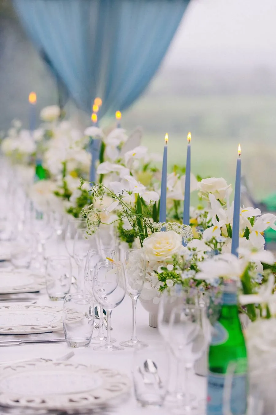 Candlelit long table with white flowers