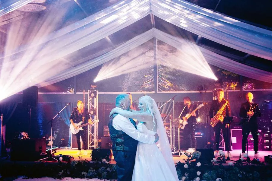 First dance with stage lighting in the marquee