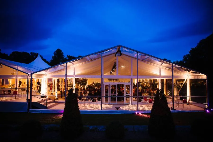 Glass-fronted marquee lit up at night
