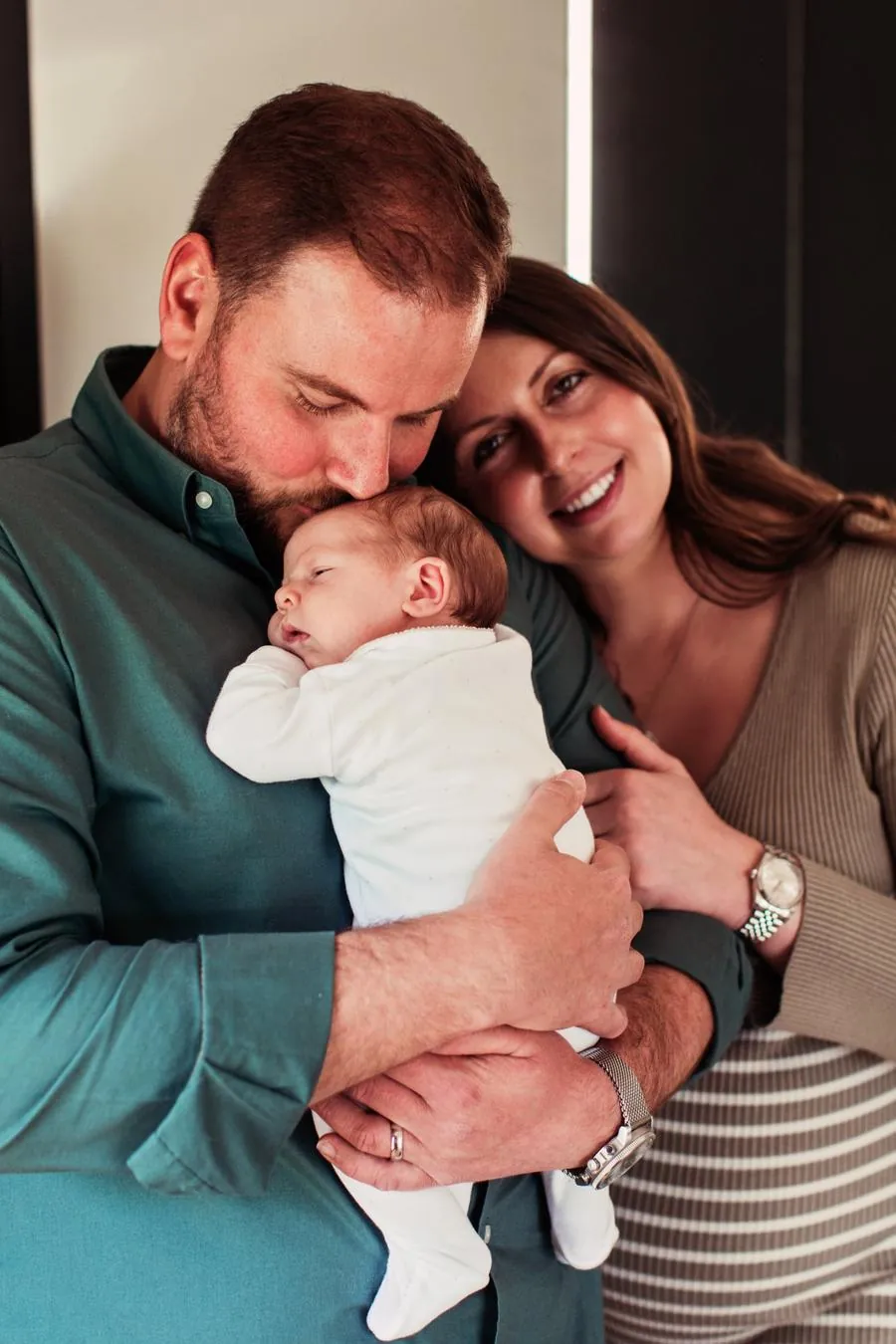 Kate and Adam with their baby son